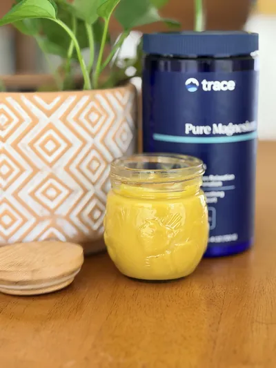 Creamy homemade magnesium balm in a glass jar